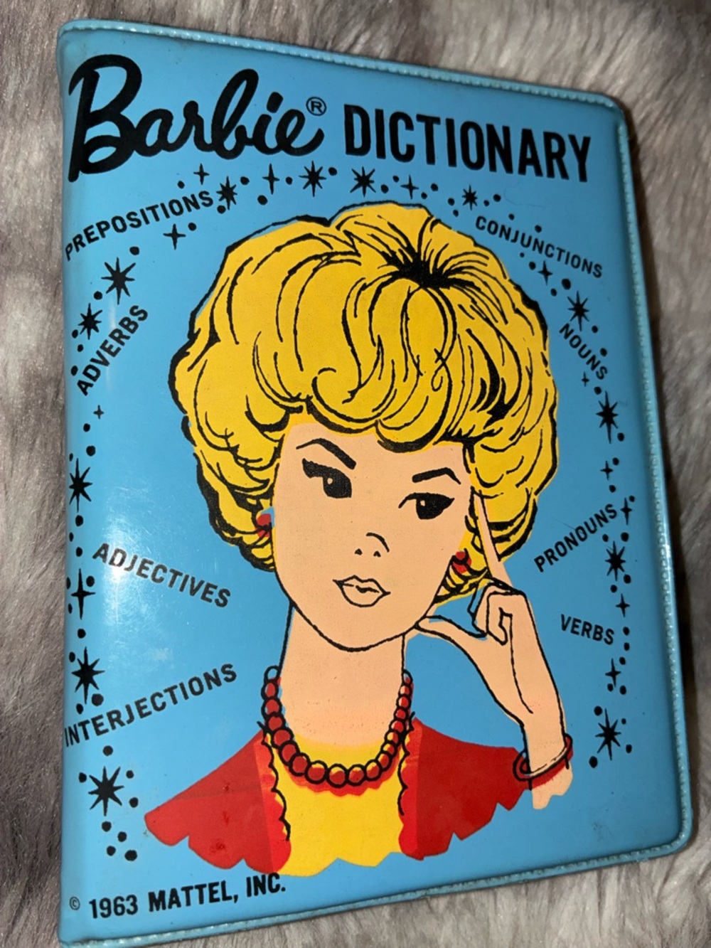 Barbie Blue Vinyl Cover with Yellow Hair and Red Accents